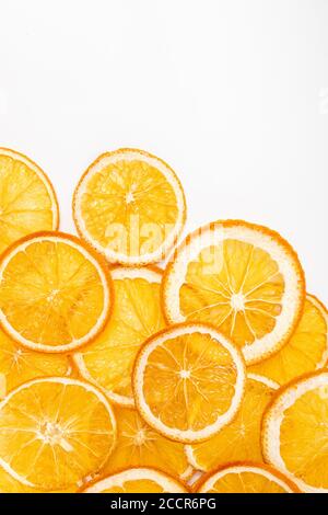 Dried orange slices on white background with copy soace Stock Photo