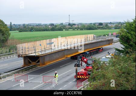 Taplow, Berkshire, UK. 15th August, 2020. The M4 was closed again this weekend between junctions 6 (Slough/Windsor) and Junction 8/9 (Maidenhead) for the installation of a new bridge  across the M4 at Lake End Road, Taplow. The hard shoulder between the M4 Junctions 3 and 12 will be converted into a traffic lane, however, the project remains controversial following the number of deaths on other UK Smart Motorways. Credit: Maureen McLean/Alamy Stock Photo