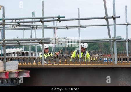 Taplow, Berkshire, UK. 15th August, 2020. The M4 was closed again this weekend between junctions 6 (Slough/Windsor) and Junction 8/9 (Maidenhead) for the installation of a new bridge  across the M4 at Lake End Road, Taplow. The hard shoulder between the M4 Junctions 3 and 12 will be converted into a traffic lane, however, the project remains controversial following the number of deaths on other UK Smart Motorways. Credit: Maureen McLean/Alamy Stock Photo