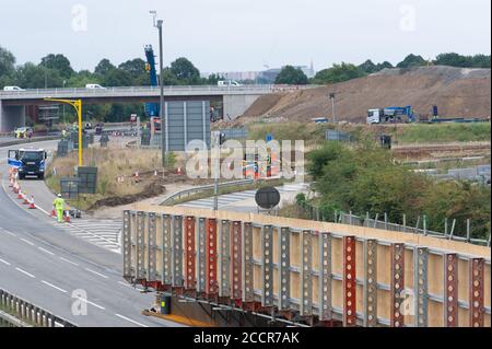 Taplow, Berkshire, UK. 15th August, 2020. The M4 was closed again this weekend between junctions 6 (Slough/Windsor) and Junction 8/9 (Maidenhead) for the installation of a new bridge  across the M4 at Lake End Road, Taplow. The hard shoulder between the M4 Junctions 3 and 12 will be converted into a traffic lane, however, the project remains controversial following the number of deaths on other UK Smart Motorways. Credit: Maureen McLean/Alamy Stock Photo