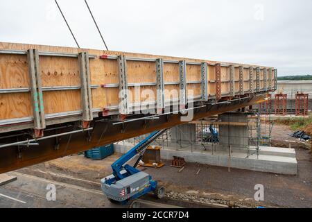 Taplow, Berkshire, UK. 15th August, 2020. The M4 was closed again this weekend between junctions 6 (Slough/Windsor) and Junction 8/9 (Maidenhead) for the installation of a new bridge  across the M4 at Lake End Road, Taplow. The hard shoulder between the M4 Junctions 3 and 12 will be converted into a traffic lane, however, the project remains controversial following the number of deaths on other UK Smart Motorways. Credit: Maureen McLean/Alamy Stock Photo