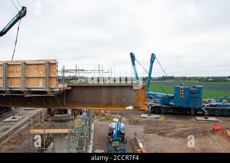 Taplow, Berkshire, UK. 15th August, 2020. The M4 was closed again this weekend between junctions 6 (Slough/Windsor) and Junction 8/9 (Maidenhead) for the installation of a new bridge  across the M4 at Lake End Road, Taplow. The hard shoulder between the M4 Junctions 3 and 12 will be converted into a traffic lane, however, the project remains controversial following the number of deaths on other UK Smart Motorways. Credit: Maureen McLean/Alamy Stock Photo