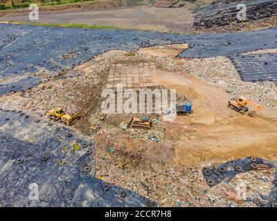 Aerial top view photo from flying drone of large garbage pile. Garbage pile in trash dump or landfill. Environmental pollution Stock Photo