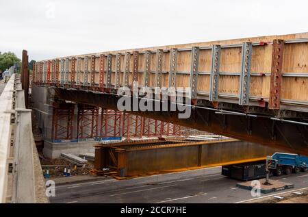 Taplow, Berkshire, UK. 15th August, 2020. The M4 was closed again this weekend between junctions 6 (Slough/Windsor) and Junction 8/9 (Maidenhead) for the installation of a new bridge  across the M4 at Lake End Road, Taplow. The hard shoulder between the M4 Junctions 3 and 12 will be converted into a traffic lane, however, the project remains controversial following the number of deaths on other UK Smart Motorways. Credit: Maureen McLean/Alamy Stock Photo