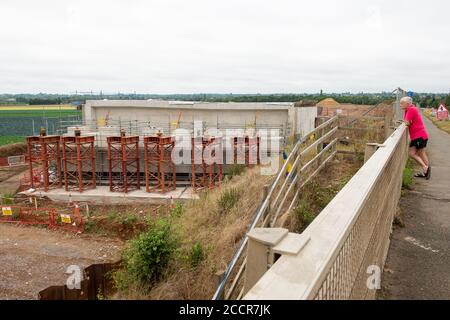 Taplow, Berkshire, UK. 15th August, 2020. The M4 was closed again this weekend between junctions 6 (Slough/Windsor) and Junction 8/9 (Maidenhead) for the installation of a new bridge  across the M4 at Lake End Road, Taplow. The hard shoulder between the M4 Junctions 3 and 12 will be converted into a traffic lane, however, the project remains controversial following the number of deaths on other UK Smart Motorways. Credit: Maureen McLean/Alamy Stock Photo