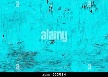 Old wooden damaged painted wall fragment. Stock Photo