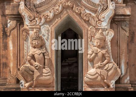 Detail of a nat statue (angel of spirit) in Tharkhaung buddhist monastery  near Inle lake in Burma, Myanmar Stock Photo - Alamy