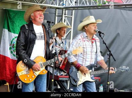 Hatfield, UK. 23rd Aug, 2020. Paul Young and Jamie Moses of Los Pacaminos Musical group perform live on stage at Hatfield Park. Credit: SOPA Images Limited/Alamy Live News Stock Photo