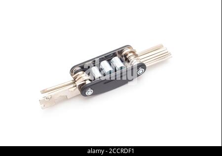 bike multifunctional tool on white background, isolate. Hexagon, screwdriver and socket concept in one tool Stock Photo
