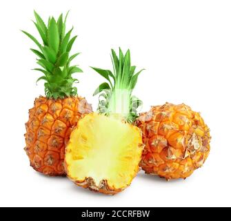 pineapple and half isolated on white background with clipping path and full depth of field Stock Photo