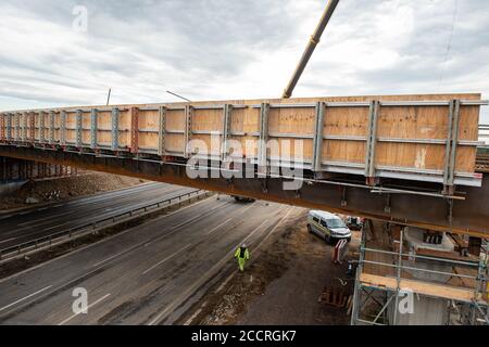 Taplow, Berkshire, UK - 16th August, 2020. The M4 was closed again this weekend between junctions 6 (Slough/Windsor) and Junction 8/9 (Maidenhead) as the final part of a new bridge across the M4 was installed. The hard shoulder between the M4 Junctions 3 and 12 will be converted into a traffic lane, however, the project remains controversial following the number of deaths on other UK Smart Motorways. Credit: Maureen McLean/Alamy Stock Photo