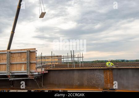 Taplow, Berkshire, UK - 16th August, 2020. The M4 was closed again this weekend between junctions 6 (Slough/Windsor) and Junction 8/9 (Maidenhead) as the final part of a new bridge across the M4 was installed. The hard shoulder between the M4 Junctions 3 and 12 will be converted into a traffic lane, however, the project remains controversial following the number of deaths on other UK Smart Motorways. Credit: Maureen McLean/Alamy Stock Photo