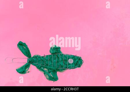 Fish from a plastic bags. Blue color, translucent. The concept of saving the environment, pollution of the oceans, seas and rivers. Background for cop Stock Photo
