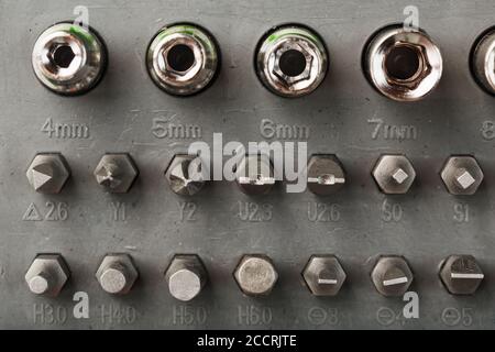 Replacement attachments and bits for repair. Tool box with various heads Stock Photo