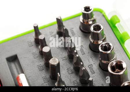 Replacement attachments and bits for repair. Tool box with various heads Stock Photo