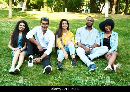 The racial association in the park. Five black people together. Stock Photo