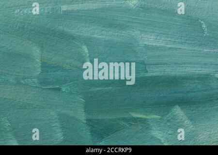 The texture of the canvas, coated with oil paints. Green and mint colors, copy space. The concept of a creative atmosphere, artistic events, education, etc. Stock Photo