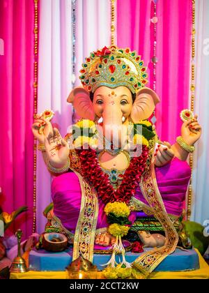 Closed up of Lord Ganesha with white and ping background Stock Photo ...