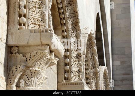 Details of the facade of the Roman Catholic cathedral dedicated to Saint Nicholas the Pilgrim in Trani, Puglia, Italy Stock Photo