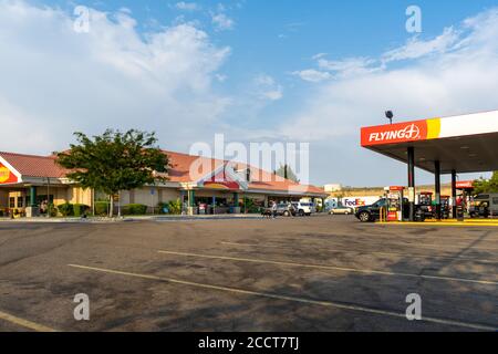 Barstow, CA / USA – August 22, 2020: View of the Flying J Travel Center located in Barstow, California, adjacent to Interstate 15 in the Mojave Desert Stock Photo