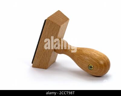 Wooden stamp against white background Stock Photo