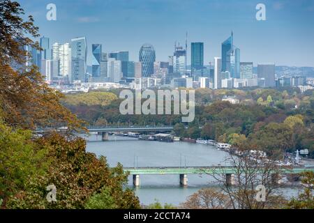 Aerial view of the towers of La Defense, business district of Paris, France. Bridges over the river Seine and the bois de Boulogne in the foreground Stock Photo