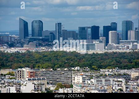 Aerial view of the towers of La Defense, business district of Paris, France, parisian buildings and the bois de Boulogne in the foreground Stock Photo