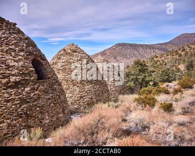 Beehive shaped Wildrose Charcoal Kilns, arid high desert landscape. Stock Photo