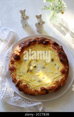Concept of romanian food. Traditional Easter cake with cheese - Pasca. Easter decorations. Top view. Stock Photo