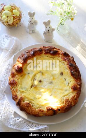 Concept of romanian food. Traditional Easter cake with cheese - Pasca. Easter decorations. Top view. Stock Photo