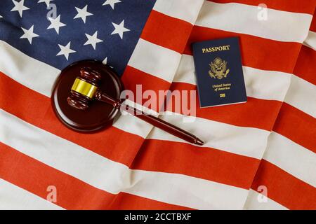 US Passports with wooden judge gavel on American flag on legal world immigration Stock Photo