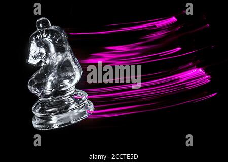 Chess pieces moving with color efects from different lights Stock Photo