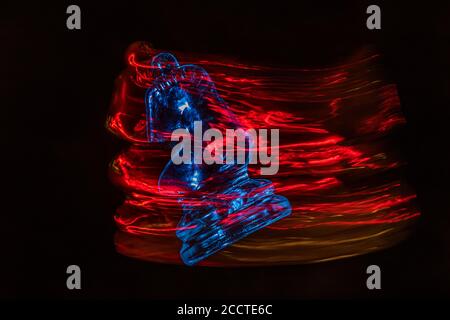 Chess pieces moving with color efects from different lights Stock Photo