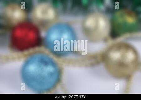 Christmas background, multicolored christmas balls out of focus, bokeh Stock Photo