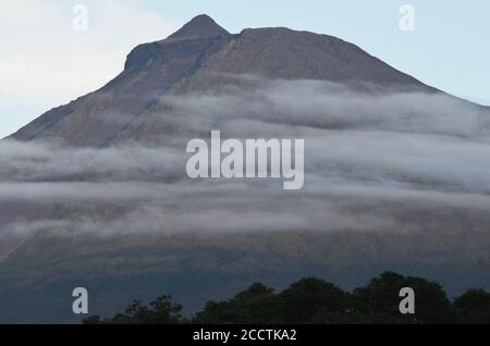 The conical Pico volcano looming over its namesake island (Azores archipelago, Portugal) Stock Photo