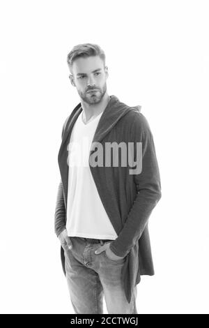 Casual and comfortable. Male fashion influencer. Fashionable model man. Street style outfit. Handsome man with hood standing white background. Fashion trend. Clothes daily wear. Menswear concept. Stock Photo