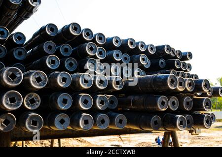 Stack of new drill pipe on racks Stock Photo - Alamy