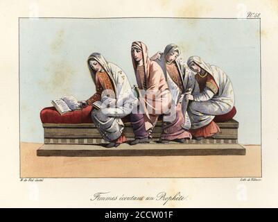 Frankish women listening to a Christian priest, 9th century. Four women in rich robes and veils seated on a sofa, reading Bibles. From an illuminated manuscript showing Saint Jerome reading to Eustachia and Paula in the Vivian Bible, King Charles the Bald’s First Bible, 845. Femmes ecoutant un Prophete. Handcoloured lithograph by Villain after an illustration by Horace de Viel-Castel from his Collection des costumes, armes et meubles pour servir à l'histoire de la France (Collection of costumes, weapons and furniture to be used in the history of France), Treuttel & Wurtz, Bossange, 1827. Stock Photo