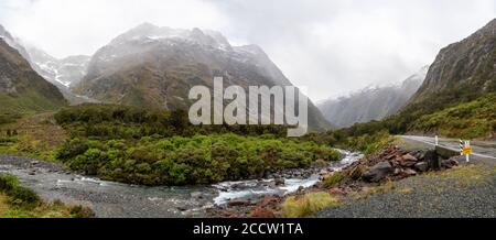 Panorama of cloudy Milford Sound highway, South Island/New Zealand Stock Photo