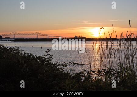 Sunset over the Columbia river in Astoria, Oregon, USA. Stock Photo