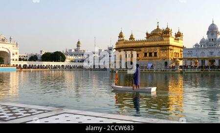 AMRITSAR, INDIA - MARCH 18, 2019: guard in a boat at golden temple in amritsar Stock Photo