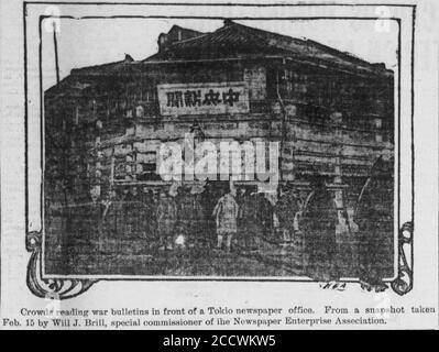 Japanese people outside a Tokyo newspaper office (February 15, 1904). Stock Photo