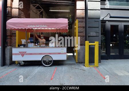 New York City, USA. 24th Aug, 2020. L'Arte del Gelato vending cart sits along 15th Street at the new Chelsea Market outdoor dining area, New York, NY, August 24, 2020. Launched on August 17 in response to the city's indoor dining restrictions due to the COVID1-9 pandemic, the collective that makes up the Chelsea Market, both food vendors and retailers, have set an almost block-long dining area for shoppers along 15th and 16th Street between 9th and 10th Avenue. (Anthony Behar/Sipa USA) Credit: Sipa USA/Alamy Live News Stock Photo