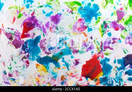 Colorful decorative rough plaster texture on white background. Close up wall grunge artwork texture. Stock Photo
