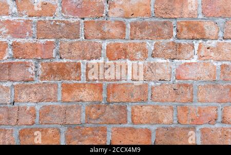 Abstract red brick wall texture light gray old stucco and vintage brickwork pattern background in home interior, grunge rusty blocks of stonework grey Stock Photo