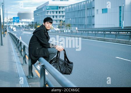 Lifestyle of young handsome asian man in the city Stock Photo