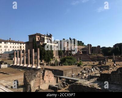 Historical The Roman Forum, Latin: Forum Romanum, Italian: Foro Romano, in the spectacular Blue sky. Stock Photo