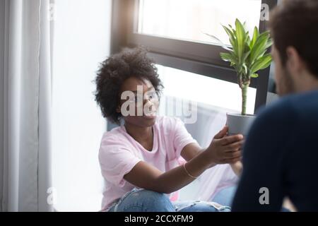 Loving people moving into a new house. Mixed race couple. so happy and enthusiastic Stock Photo