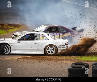 Scott Massari leading Justin Gruener around the first corner during their battle at Victorian Drift Club's first competition round at Calder Park Stock Photo