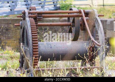 Rusty old harbour winch Stock Photo